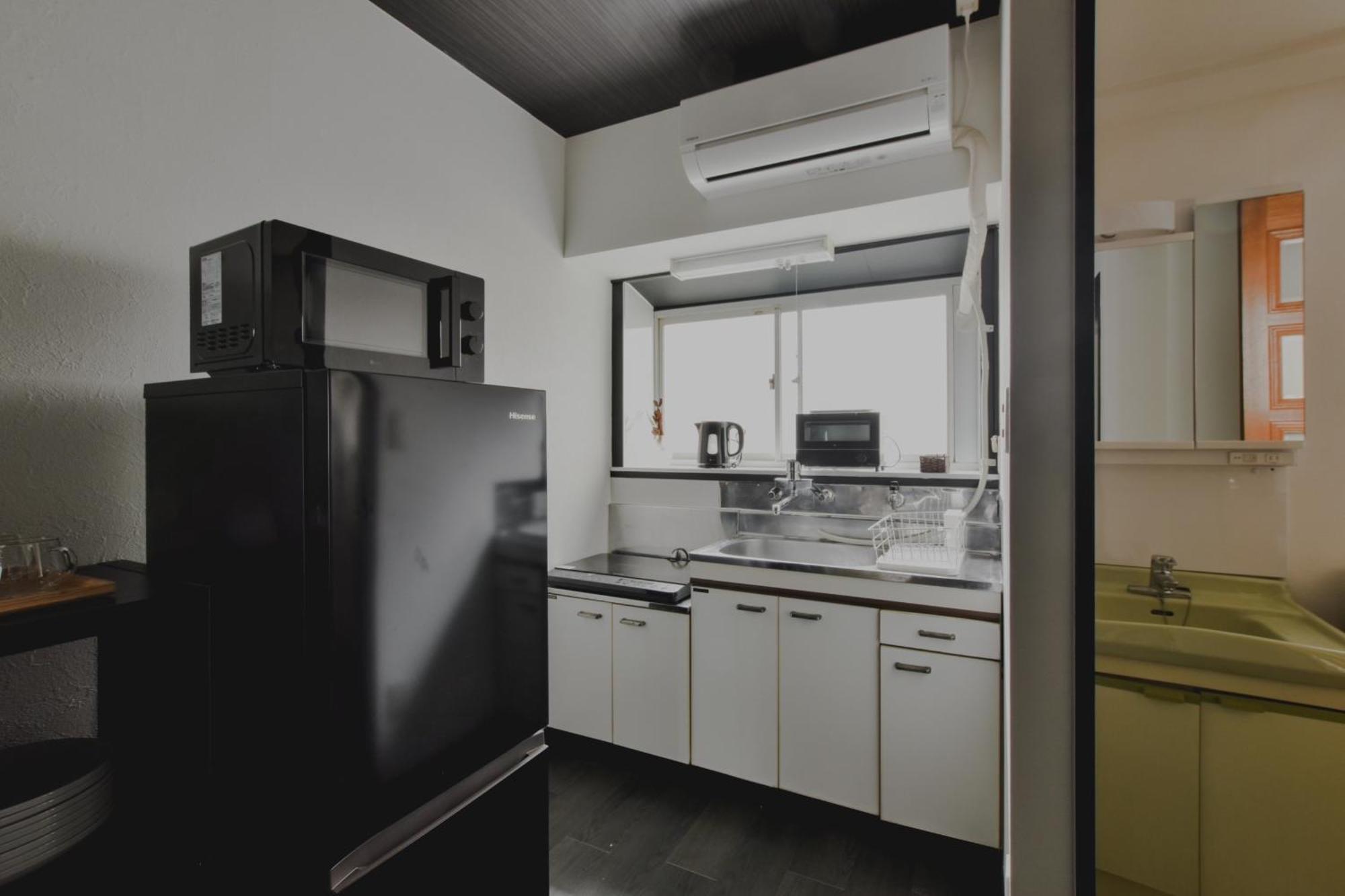 岡田ビル4階 Appartement Tokio Buitenkant foto
